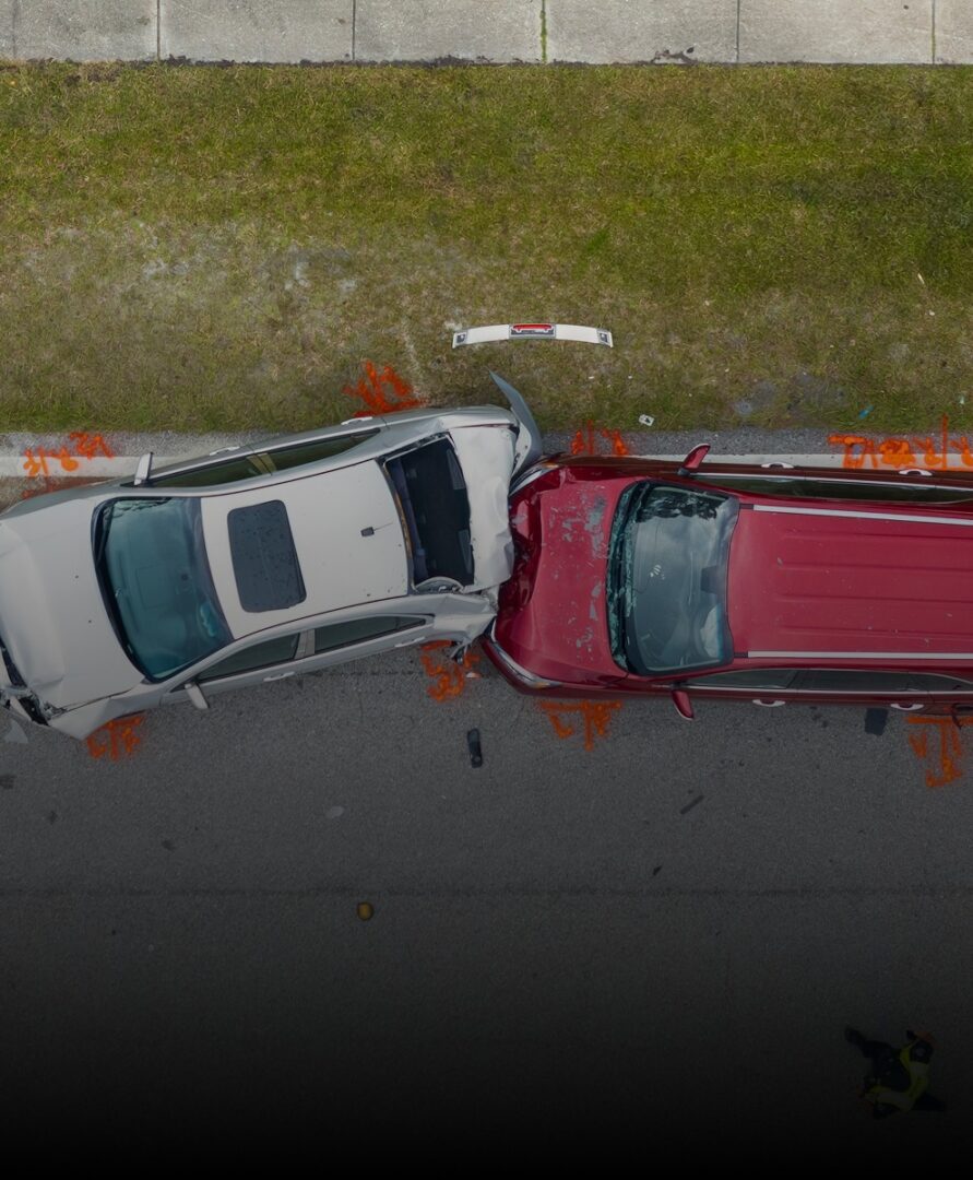 Two cars collided on the roadside.