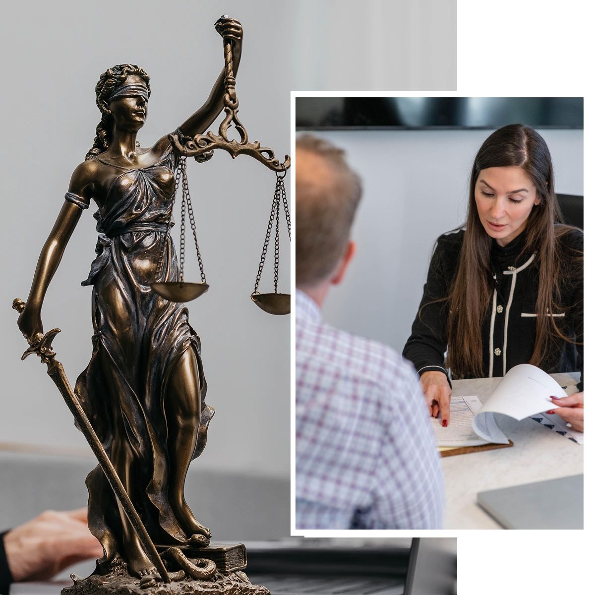 Lady Justice statue beside lawyer consulting client
